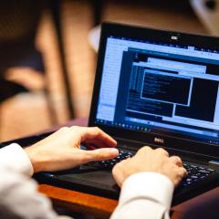 person using laptop